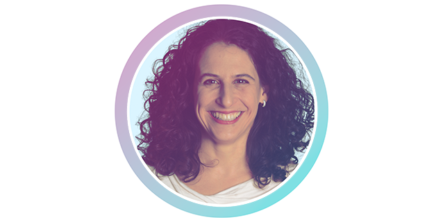 A portrait of a woman with curly hair.