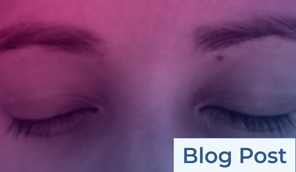 A close up of a woman's eyes with the words blog post.